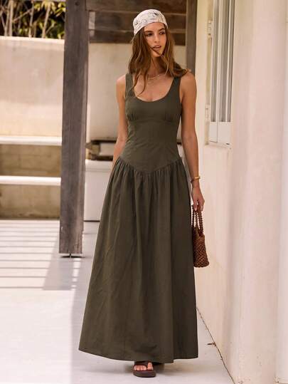 Long scoop-neck dress photographed outdoors